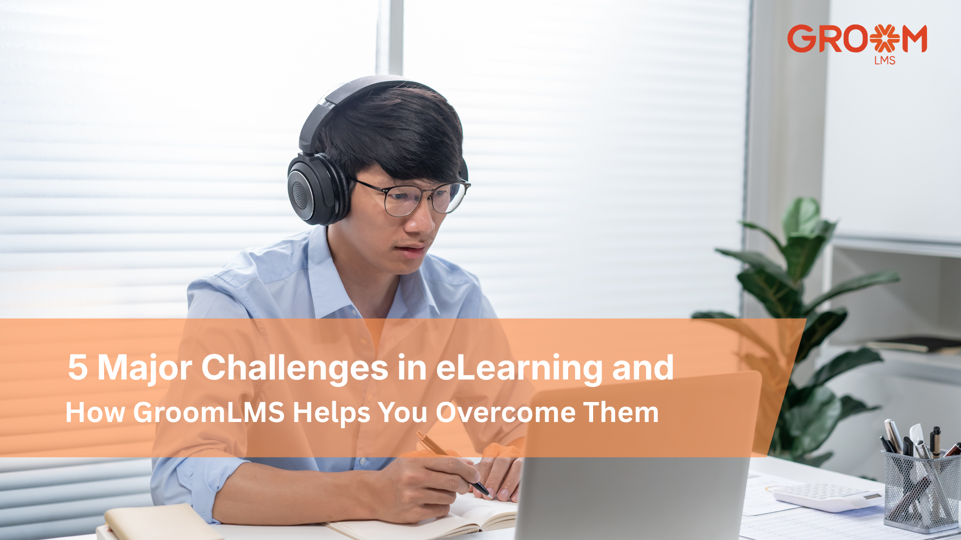 Professional employee participating in an online training session using a laptop and headphones, representing common eLearning challenges and digital learning solutions with GroomLMS.