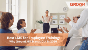 Best LMS for employee training with corporate team attending a business learning and development session using GroomLMS