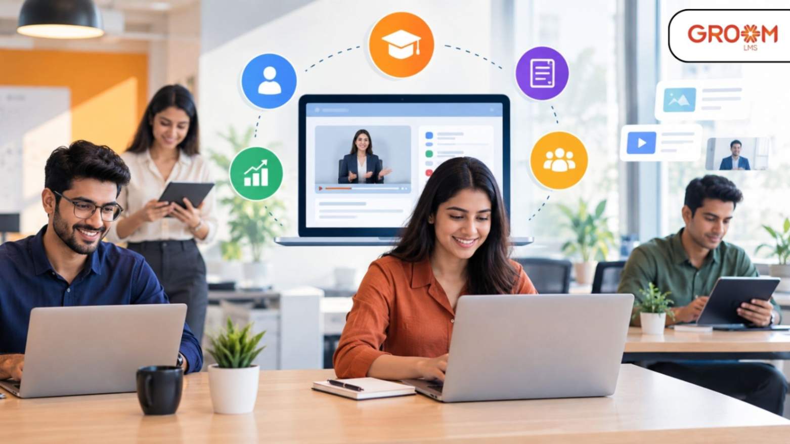 Corporate employees using an enterprise LMS for digital workplace training