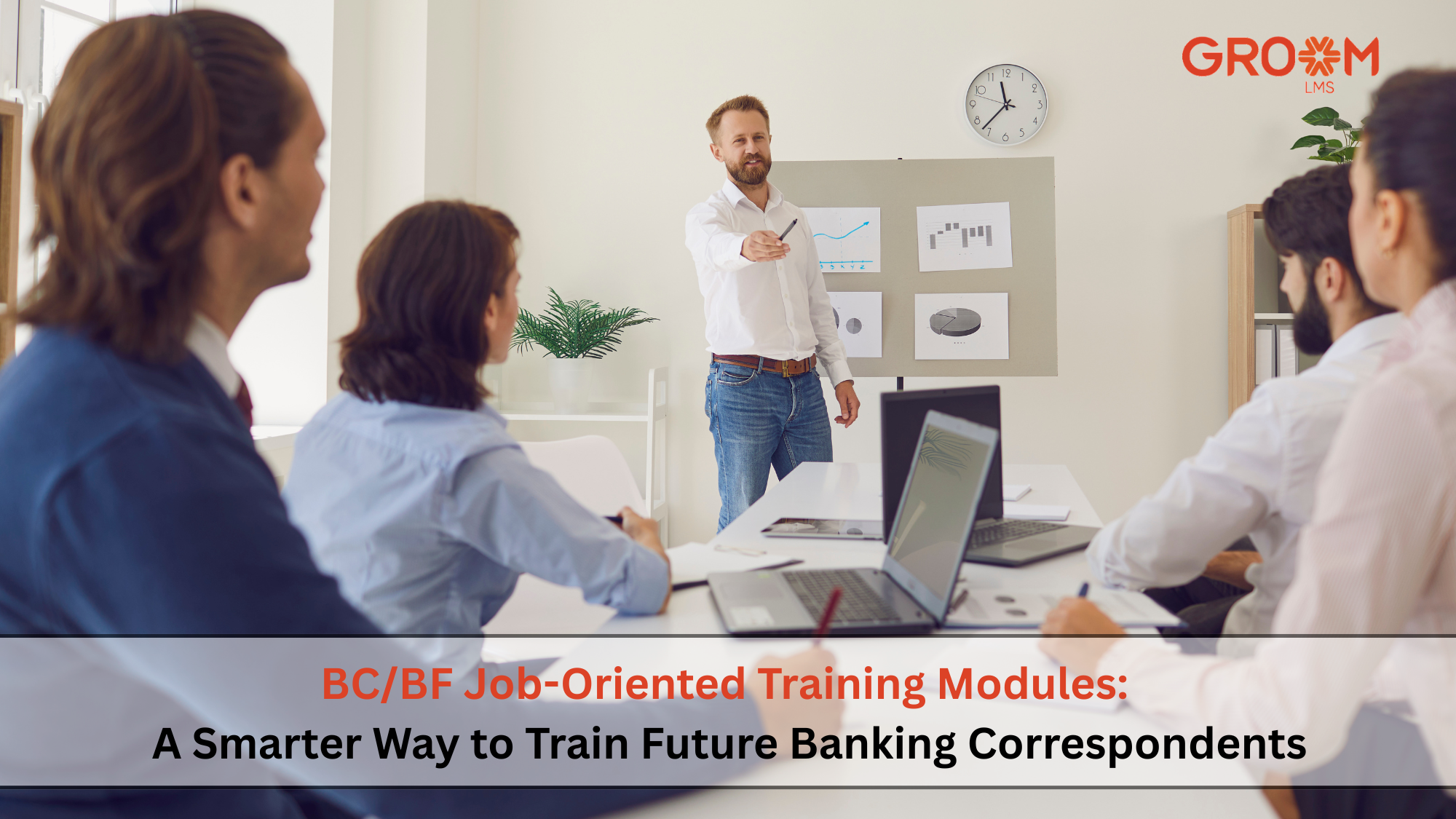 Corporate trainer conducting a BC/BF job-oriented training session for future banking correspondents using GroomLMS.