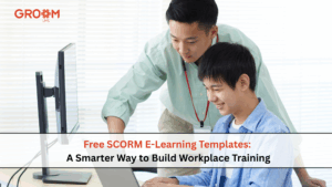 Two professionals collaborating on a computer while creating workplace training with free SCORM e-learning templates.