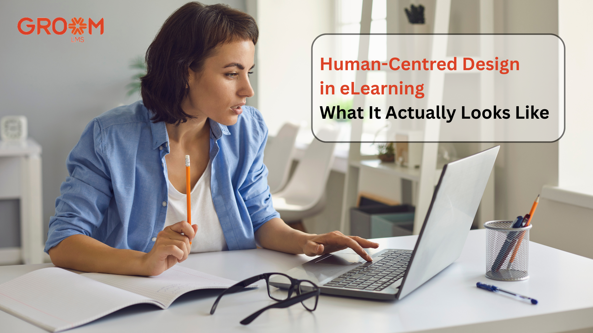 Professional working on a laptop illustrating human-centred design in eLearning.