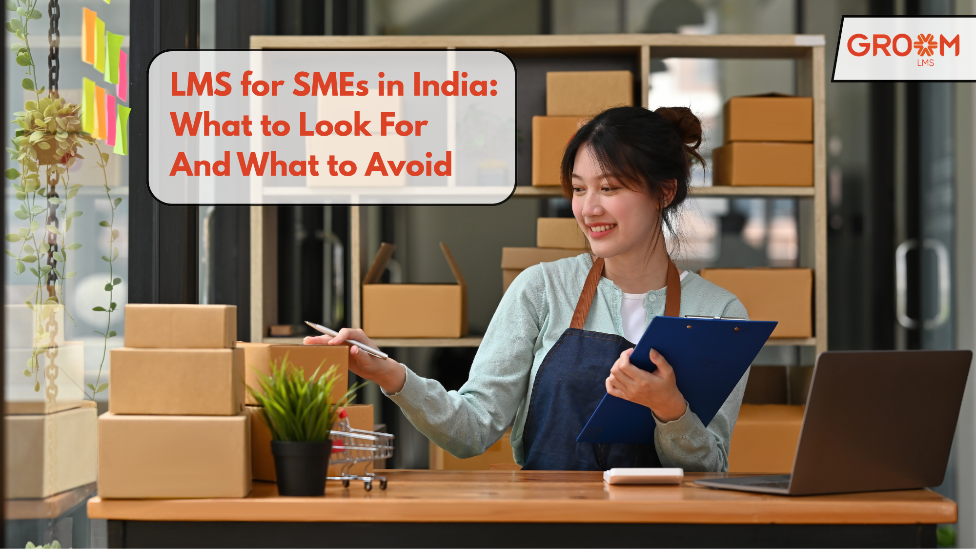 Small business owner managing inventory while learning about choosing the right LMS for SMEs in India.