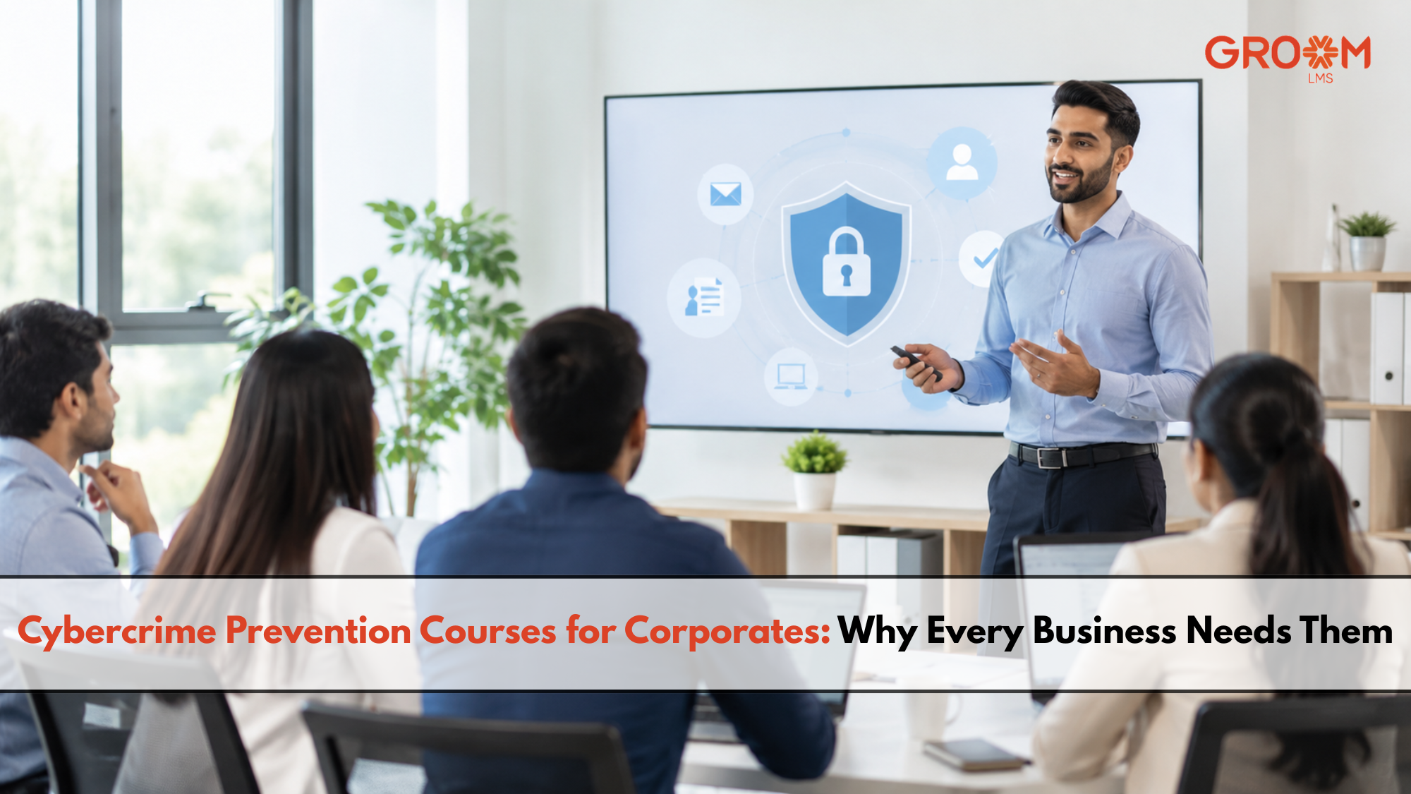 Employees attending a corporate cybersecurity awareness training presentation.