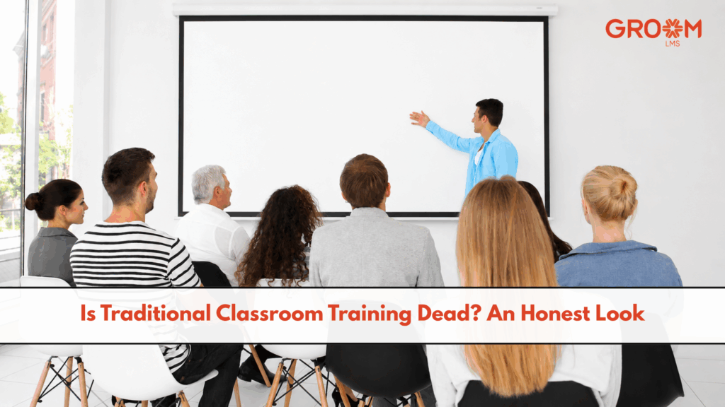 Employees attending a traditional classroom training session with an instructor presenting at the front.