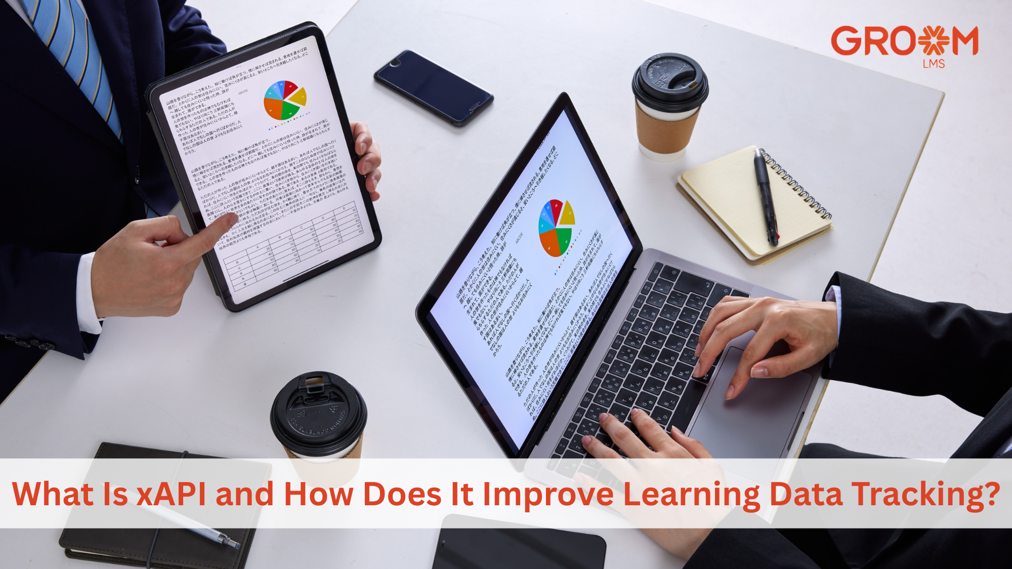 Professionals reviewing xAPI learning analytics on digital devices during a workplace training session.