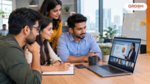 Employees participating in a corporate online learning session using an LMS in a modern office.