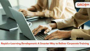 Corporate employees using laptops for rapid e-learning development and online training.